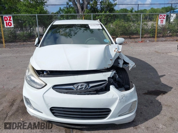 2014 Hyundai Accent GLS with VIN KMHCU4AE8EU608539, listed as a IAAI auction lot 41946784 with 106,709 mi miles and . Bid and sale history available at carsss.com. Image 6.