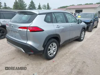 2023 Toyota Corolla Cross L with VIN 7MUAAABG9PV047493, listed as a IAAI auction lot 42441413 with 15,485 mi miles and . Bid and sale history available at DreamBid. Image 4.