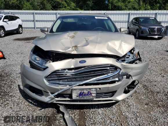 2015 Ford Fusion SE Hybrid z VIN 3FA6P0LU7FR102723, wystawiony jako Copart lot #62334345 z przebiegiem 136 341 mil mil oraz Nie do naprawy • Non repairable. Historia ofert i sprzedaży dostępna na DreamBid. Obrazek 5.