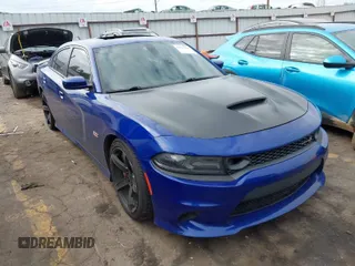2019 Dodge Charger Scat Pack with VIN 2C3CDXGJ4KH646797, listed as a IAAI auction lot 41531570 with 68,815 mi miles and . Bid and sale history available at DreamBid. Image 1.