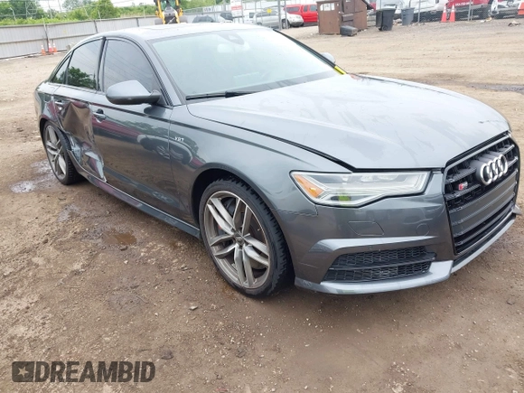 2016 Audi S6 Prestige z VIN WAUH2AFC1GN016187, wystawiony jako IAAI lot #42274744 z przebiegiem 169 821 mil mil oraz . Historia ofert i sprzedaży dostępna na DreamBid. Obrazek 1.