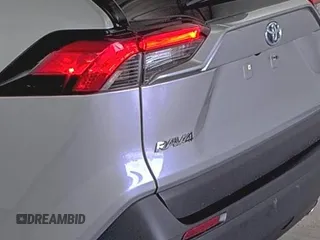 2022 Toyota RAV4 Hybrid XLE Premium with VIN 4T3B6RFV5NU085564, listed as a IAAI auction lot 42854215 with 49,616 mi miles and . Bid and sale history available at DreamBid. Image 18.