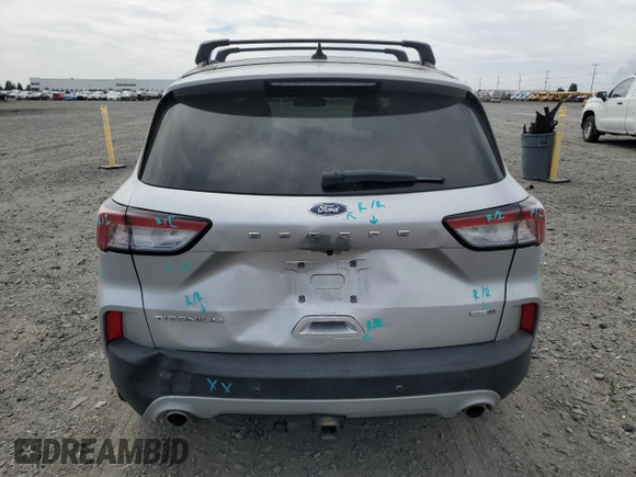 2020 Ford Escape Titanium with VIN 1FMCU9J99LUB07009, listed as a Copart auction lot 63213495 with 61,376 mi miles and Salvage title. Bid and sale history available at DreamBid. Image 6.