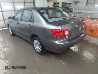 2004 Toyota Corolla CE with VIN 1NXBR32E14Z204650, listed as a IAAI auction lot 41710452 with 168,099 mi miles. Bid and sale history available at carsss.com. Image 3.