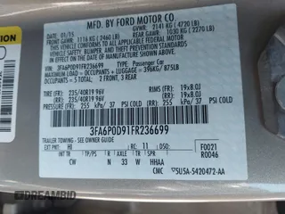 2015 Ford Fusion Titanium with VIN 3FA6P0D91FR236699, listed as a IAAI auction lot 41977478 with 203,394 mi miles. Bid and sale history available at carsss.com. Image 9.