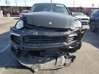 2017 Porsche Cayenne with VIN WP1AA2A20HKA80640, listed as a Copart auction lot 61038585 with 60,893 mi miles and Salvage title. Bid and sale history available at DreamBid. Image 5.