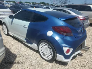 2016 Hyundai Veloster Turbo z VIN KMHTC6AEXGU261247, wystawiony jako Copart lot #52240215 z przebiegiem 137 238 mil mil oraz Czysty tytuł • Clean title. Historia ofert i sprzedaży dostępna na DreamBid. Obrazek 2.