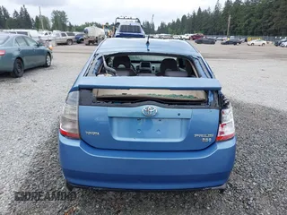 2005 Toyota Prius z VIN JTDKB20U150118440, wystawiony jako IAAI lot #42090135 z przebiegiem 263 095 mil mil oraz . Historia ofert i sprzedaży dostępna na DreamBid. Obrazek 16.