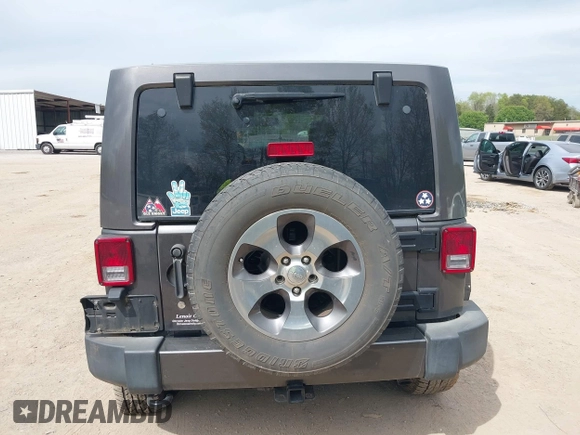 2017 Jeep Wrangler Unlimited Sahara with VIN 1C4BJWEGXHL595724, listed as a IAAI auction lot 42018264 with 95,948 mi miles. Bid and sale history available at carsss.com. Image 16.
