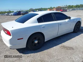 2012 Dodge Charger Police with VIN 2C3CDXAG7CH172472, listed as a IAAI auction lot 42031896 with 196,887 mi miles. Bid and sale history available at carsss.com. Image 4.