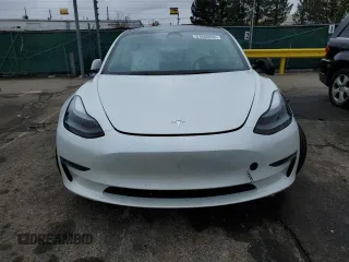 2023 Tesla Model 3 with VIN 5YJ3E1EAXPF600008, listed as a Copart auction lot 51868055 with 58,733 mi miles and Salvage title. Bid and sale history available at DreamBid. Image 5.