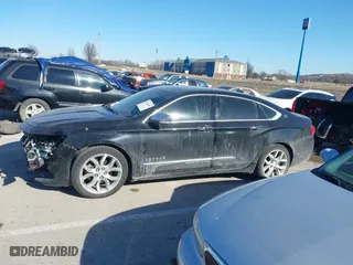 2014 Chevrolet Impala LTZ with VIN 2G1155S31E9105694, listed as a IAAI auction lot 41414595 with 128,828 mi miles. Bid and sale history available at carsss.com. Image 15.