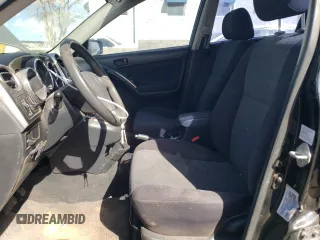 2003 Toyota Matrix Std with VIN 2T1KR32E63C085154, listed as a Copart auction lot 87884645 with 173,360 mi miles and Salvage Title. Bid and sale history available at DreamBid. Image 7.