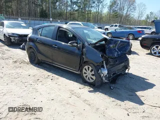 2013 Toyota Prius One z VIN JTDKDTB33D1529206, wystawiony jako IAAI lot #41874722 z przebiegiem 99 417 mil mil oraz . Historia ofert i sprzedaży dostępna na DreamBid. Obrazek 1.