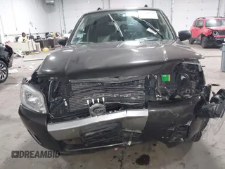 2006 Mercury Mariner Luxury с VIN 4M2CU56126KJ03006, выставлен на аукционе IAAI как лот 42476543 с пробегом 114 288 миль миль и . История ставок и продаж доступна на DreamBid. Изображение 12.