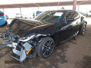 2023 Toyota GR86 with VIN JF1ZNBC1XP8751486, listed as a IAAI auction lot 41692791 with 12,460 mi miles. Bid and sale history available at carsss.com. Image 2.