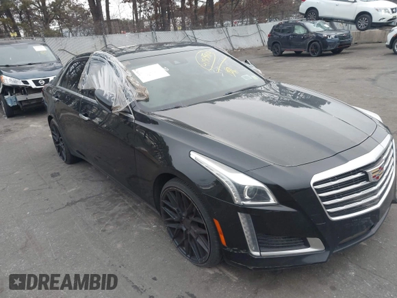 2019 Cadillac CTS Luxury RWD with VIN 1G6AR5SS2K0100788, listed as a IAAI auction lot 41515814 with 70,799 mi miles and . Bid and sale history available at DreamBid. Image 1.