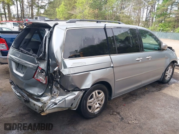 2006 Honda Odyssey EX with VIN 5FNRL38406B066176, listed as a IAAI auction lot 42028052 with 136,305 mi miles and . Bid and sale history available at DreamBid. Image 4.