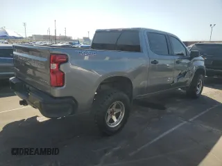 2021 Chevrolet Silverado 1500 Custom Trail Boss with VIN 1GCPYCEF5MZ430436, listed as a Copart auction lot 52027245 with 60,656 mi miles and Salvage Title. Bid and sale history available at DreamBid. Image 3.