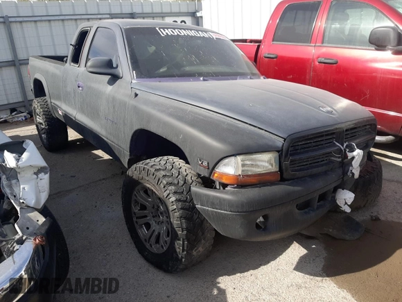 2000 Dodge Dakota SLT with VIN 1B7GG22X1YS655459, listed as a Copart auction lot 84569564 with 240,478 mi miles and Non Repairable. Bid and sale history available at DreamBid. Image 4.