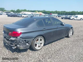 2012 BMW 5 Series 535i xDrive with VIN WBAFU7C53CDU65509, listed as a IAAI auction lot 39650260 with 999,999 mi miles. Bid and sale history available at carsss.com. Image 4.