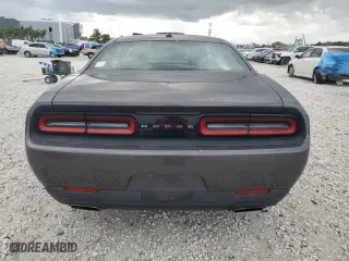 2015 Dodge Challenger SXT with VIN 2C3CDZAG4FH728088, listed as a Copart auction lot 52515645 with 128,104 mi miles and Salvage Title. Bid and sale history available at carsss.com. Image 6.