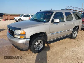 2005 GMC Yukon SLT with VIN 1GKEK13T95R203827, listed as a IAAI auction lot 41815086 with 136,671 mi miles. Bid and sale history available at carsss.com. Image 2.