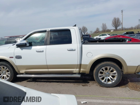 2014 Ram 1500 Longhorn Limited with VIN 1C6RR7PT9ES127063, listed as a IAAI auction lot 41817112 with 126,203 mi miles and . Bid and sale history available at DreamBid. Image 15.