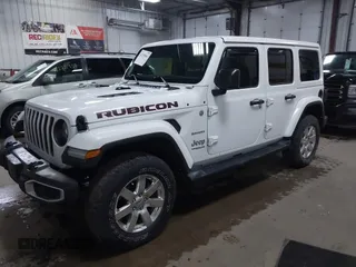 2018 Jeep Wrangler Unlimited Sahara z VIN 1C4HJXEG3JW117990, wystawiony jako IAAI lot #42290861 z przebiegiem 86 907 mil mil oraz . Historia ofert i sprzedaży dostępna na DreamBid. Obrazek 17.