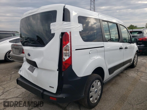 2022 Ford Transit Connect XL z VIN NM0GE9E29N1524891, wystawiony jako Copart lot #67585133 z przebiegiem 7 025 mil mil oraz . Historia ofert i sprzedaży dostępna na DreamBid. Obrazek 3.