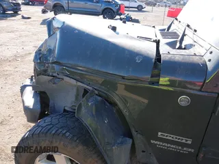 2015 Jeep Wrangler Unlimited Sport with VIN 1C4BJWDG5FL745673, listed as a IAAI auction lot 41681043 with 97,605 mi miles and . Bid and sale history available at DreamBid. Image 6.