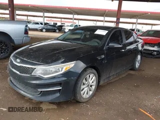 2018 Kia Optima LX with VIN 5XXGT4L39JG251635, listed as a IAAI auction lot 41933408 with 135,718 mi miles. Bid and sale history available at carsss.com. Image 2.