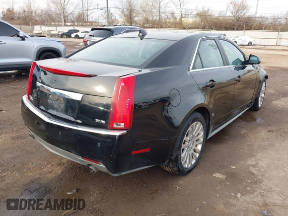 2011 Cadillac CTS Premium with VIN 1G6DS5ED7B0101210, listed as a IAAI auction lot 41802027 with 127,701 mi miles. Bid and sale history available at carsss.com. Image 4.