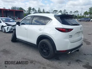 2021 Mazda CX-5 Signature with VIN JM3KFBEY0M0436264, listed as a IAAI auction lot 41568892 with 36,833 mi miles. Bid and sale history available at carsss.com. Image 3.