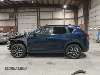 2018 Mazda CX-5 Touring with VIN JM3KFBCM5J0434716, listed as a IAAI auction lot 41738956 with 108,264 mi miles and . Bid and sale history available at DreamBid. Image 15.