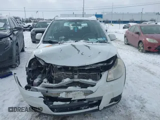 2012 Suzuki SX4 Crossover with VIN JS2YB5A31C6304822, listed as a IAAI auction lot 41366800 with 123,672 mi miles and . Bid and sale history available at DreamBid. Image 12.