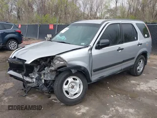 2002 Honda CR-V LX z VIN JHLRD78402C077631, wystawiony jako IAAI lot #41918750 z przebiegiem 186 827 mil mil oraz . Historia ofert i sprzedaży dostępna na DreamBid. Obrazek 17.