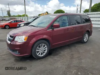 2019 Dodge Grand Caravan SXT with VIN 2C4RDGCGXKR807759, listed as a Copart auction lot 56098575 with 119,268 mi miles and Salvage Title. Bid and sale history available at DreamBid. Image 1.