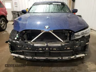 2021 BMW 3 Series 330i xDrive with VIN 3MW5R7J05M8B65599, listed as a Copart auction lot 51707945 with 50,278 mi miles and Salvage Title. Bid and sale history available at DreamBid. Image 5.