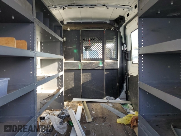 2016 Ford Transit Cargo z VIN 1FTYR2CM8GKA40117, wystawiony jako Copart lot #42287895 z przebiegiem Nie podano mil oraz Szkoda całkowita • Salvage title. Historia ofert i sprzedaży dostępna na DreamBid. Obrazek 10.