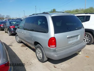 2000 Dodge Caravan SE z VIN 2B4GP45G7YR614145, wystawiony jako IAAI lot #42098834 z przebiegiem 148 924 mil mil oraz . Historia ofert i sprzedaży dostępna na DreamBid. Obrazek 3.
