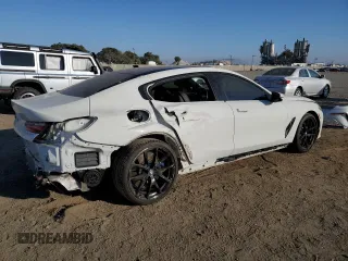 2022 BMW 8 Series 840i with VIN WBAGV2C0XNCG81832, listed as a Copart auction lot 74798684 with 27,972 mi miles and Salvage Title. Bid and sale history available at carsss.com. Image 3.