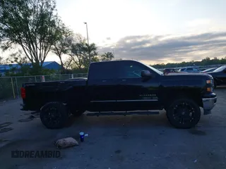 2015 Chevrolet Silverado 1500 LT with VIN 1GCVKREC3FZ241773, listed as a IAAI auction lot 42054178 with 146,304 mi miles. Bid and sale history available at carsss.com. Image 12.
