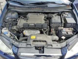 2009 Hyundai Elantra GLS z VIN KMHDU46D69U760247, wystawiony jako Copart lot #59694895 z przebiegiem 215 328 mil mil oraz Szkoda całkowita • Salvage title. Historia ofert i sprzedaży dostępna na DreamBid. Obrazek 11.