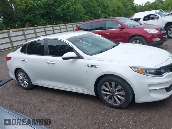 2018 Kia Optima S with VIN 5XXGT4L36JG265878, listed as a IAAI auction lot 42302801 with 101,927 mi miles and . Bid and sale history available at DreamBid. Image 14.