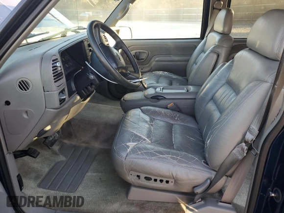 1999 Chevrolet Suburban with VIN 3GNEC16R3XG257322, listed as a Copart auction lot 77601224 with 196,923 mi miles and Salvage Title. Bid and sale history available at carsss.com. Image 7.