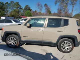 2015 Jeep Renegade Latitude with VIN ZACCJBBT0FPB67030, listed as a IAAI auction lot 41866195 with 120,618 mi miles. Bid and sale history available at carsss.com. Image 14.