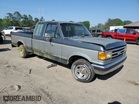 1990 Ford F-150 with VIN 1FTEX15NXLKA72702, listed as a Copart auction lot 52421535 with 720,181 mi miles and Clean Title. Bid and sale history available at carsss.com. Image 4.