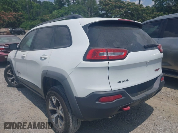 2015 Jeep Cherokee Trailhawk z VIN 1C4PJMBS3FW511564, wystawiony jako IAAI lot #42424468 z przebiegiem 169 167 mil mil oraz . Historia ofert i sprzedaży dostępna na DreamBid. Obrazek 3.