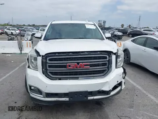 2017 GMC Yukon SLT with VIN 1GKS2BKC9HR125757, listed as a IAAI auction lot 42034182 with 72,333 mi miles. Bid and sale history available at carsss.com. Image 12.